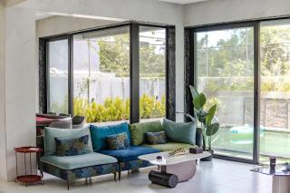 RE Oasis 5BHK Luxury Pure Veg Villa with Pool By Rare Earth Stays - 4