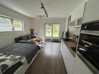 Moderne 1-Zimmer-Gästewohnung im Neubau mit schönem Garten - 5