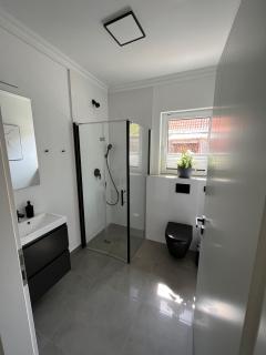 Moderne 1-Zimmer-Gästewohnung im Neubau mit schönem Garten - 4