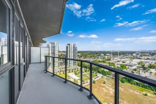 Sleek 2BR Condo with Balcony & Skyline Views - 6