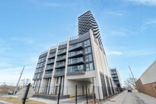 Sleek 2BR Condo with Balcony & Skyline Views - 3