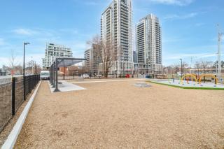 Sleek 2BR Condo with Balcony & Skyline Views - 2