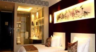 New Century Hotel Zaozhuang Fengming - 4
