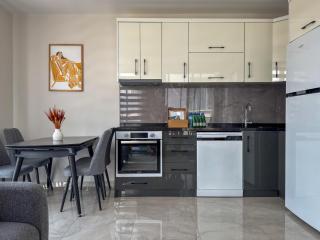 Qoople Andromeda Residence Apartments - 8