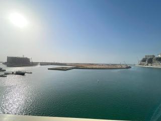 Lagoon View 2BR l Pool, Beach and Modern Stay - 6