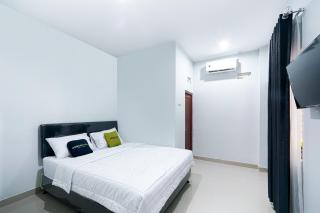 Urbanview Hotel Danoufa Supratman by RedDoorz - 3