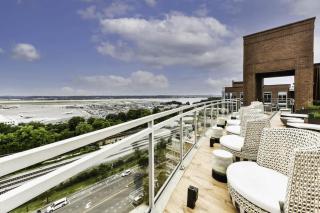 Urban 2BR Oasis with Scenic Rooftop and Gym - 4