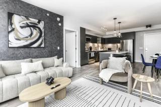 Comfy 2BR Oasis with Scenic Rooftop & Gym - 9