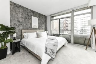 Comfy 2BR Oasis with Scenic Rooftop & Gym - 6