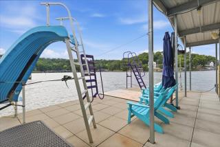 Lake Fun Retreat w/ Sunroom, PWC & Boat Slip, Dock Slide & Views - 0
