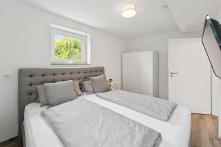 Super gelegene moderne Wohnung mit Garage in der Nähe des Badestrandes - 4
