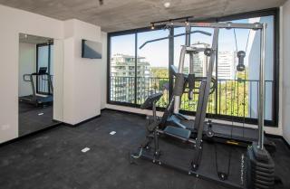 Stylish City Apartment with Balcony Pool and Gym - 5