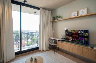 Spacious Stay with Balcony City Views & Pool BBQ - 9
