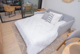 Cozy Central Stay Near Top Malls with Pool and Gym - 1