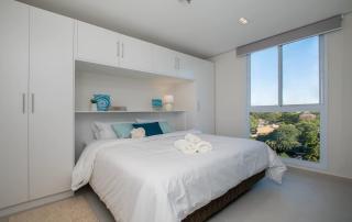Modern Stay in Prime Area with Pool and Gym - 9