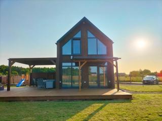 Ferienhaus Dziwna 70qm bis 7 Gäste mit Fass-Sauna, Whirlpool, großer Terrasse, eingezäuntem Garten & bis zu 6 Hunde kostenlos - 0