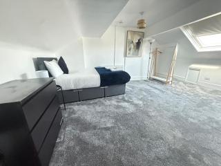 Comfortable 3-Bedroom Home with Free Parking - 1