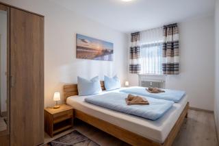 Zweizimmer Erdgeschoss Wohnung mit Terrasse 4 - 6