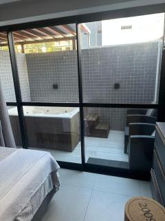 Apartamento com jacuzzi privativa e piscina com vista pro mar - 1