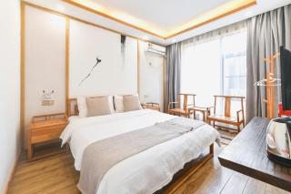 张家界市拾木客栈天门山店Shi Mu Inn Tianmen Mountain Branch in Zhangjiajie City - 0
