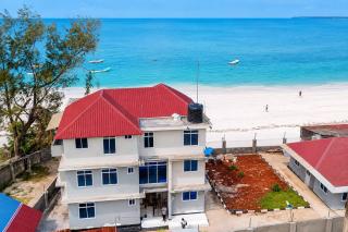 Ocean-View Balcony - Uroa 2 bedroom Beachfront apt - 9
