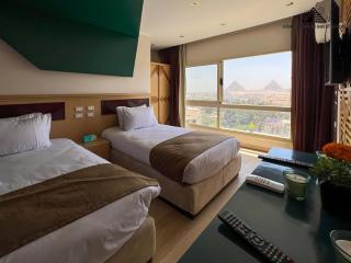 Grand Museum with Pyramids view inn - 0