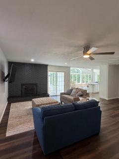 Large home with hot tub in serene wooded setting - 0