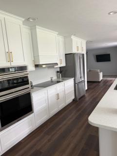 Large home with hot tub in serene wooded setting - 7