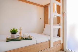 Combined and Spacious 3BR at Green Pramuka City Apartment By Travelio - 1