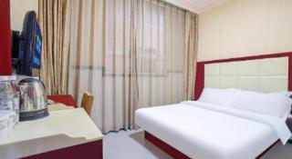 Kunming Tong Yi Business Hotel - Kunming - 1