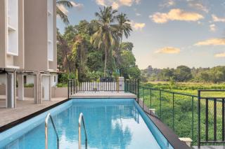 Field View 2BHK Retreat, 1km to Candolim Beach - Palms by Umiya by HIREAVILLA - 0