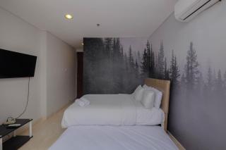 Luxury and Strategic 1BR Apartment at The Empyreal Epicentrum By Travelio - 8