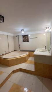 Spacious AC Bedroom with Wardrobe and Bathtub - 3