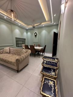Stylish 2BR Fully Furnished Prime, Lahore PK - 1