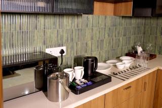 2 BHK Flat with Balcony Fleezio Stays Sec 42 Golf Course Rd - 3