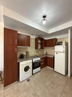 Moderno departamento con balcón y parrilla - 0