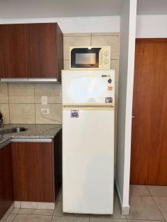 Moderno departamento con balcón y parrilla - 1