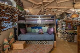 Whimsical Earth House with Colorful Bottle Architecture Near Saguaro National Park in Tucson, Arizona - 9