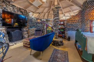 Whimsical Earth House with Colorful Bottle Architecture Near Saguaro National Park in Tucson, Arizona - 4
