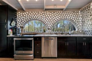 Artistic Earth House with Vibrant Glass Bottle Architecture Near Saguaro National Park in Tucson, Arizona - 4