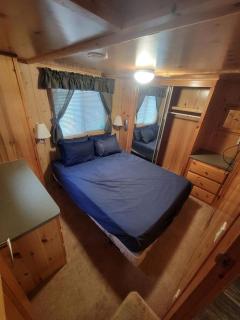 Cozy Log Cabin with Loft Bed & Central Air Conditioning - 1