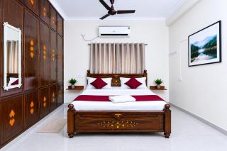 SLS Homestay - Luxury AC Service Apartments 1BHK, 2BHK, 3BHK - Direct Flyover to Alipiri Tirumala Gate - Walk to PS4 Pure Veg Restaurants, Supermarkets - Near to National Highway & Padmavathi Amma Temple - Modular Kitchen, Living room -Free Superfast Wifi - 9