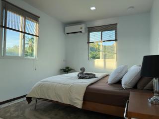 Stylish 2BR Bungalow with AC and 3 Minute Beach Walk - 1