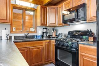Lakefront Chalet-Style Home with Large Deck, a Dock & Beautiful Lake Views - 9