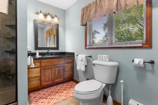 Lakefront Chalet-Style Home with Large Deck, a Dock & Beautiful Lake Views - 1
