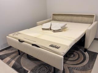 Garzonier moderno con Sofá cama premium, WiFi 150Mb y Lavadora - 1