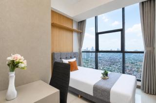 Exclusive and Comfortable 2BR Apartment Casa Grande Residence By Travelio - 8