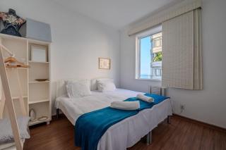 Vista para a praia de Copacabana, quarto e sala - 5