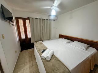 Casas com 2 suítes (ambas com ar split) e internet privativa 300MBPS, no Residencial Village do Bosque, condomínio com quiosques com churrasqueiras , piscina, sauna portaria 24hrs, a aproximadamente 200m da praia de Taperapuã Axé Moi - 7