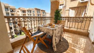 Cozy & Quiet 2BR Retreat in Madinaty - 1